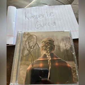 Unsealed signed Taylor Swift evermore CD